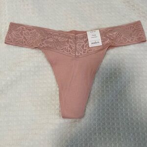 New, thong with lace detail size Medium